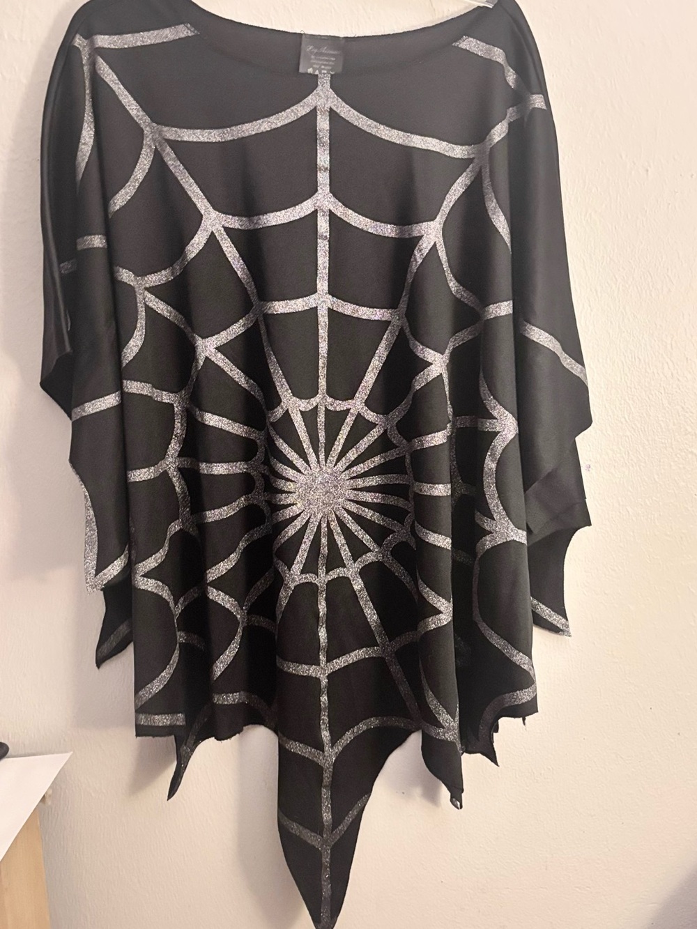 Black & silver spiderweb top with asymmetrical hem